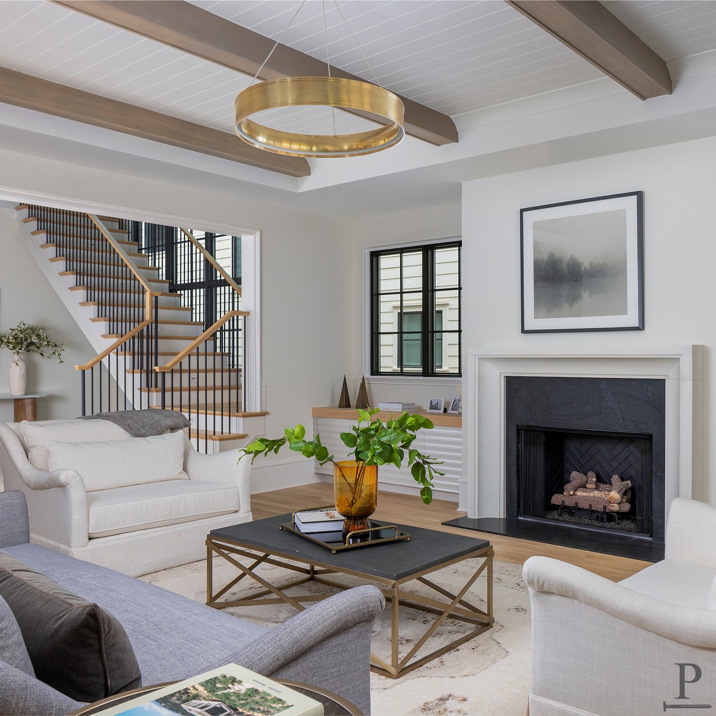 Where comfort meets character—and every detail tells a story. ✨ From the warmth of the fireplace to custom built-ins and striking overhead beams, this living room is designed to feel inviting, timeless, and uniquely yours. Would you curl up here for a cozy evening in?