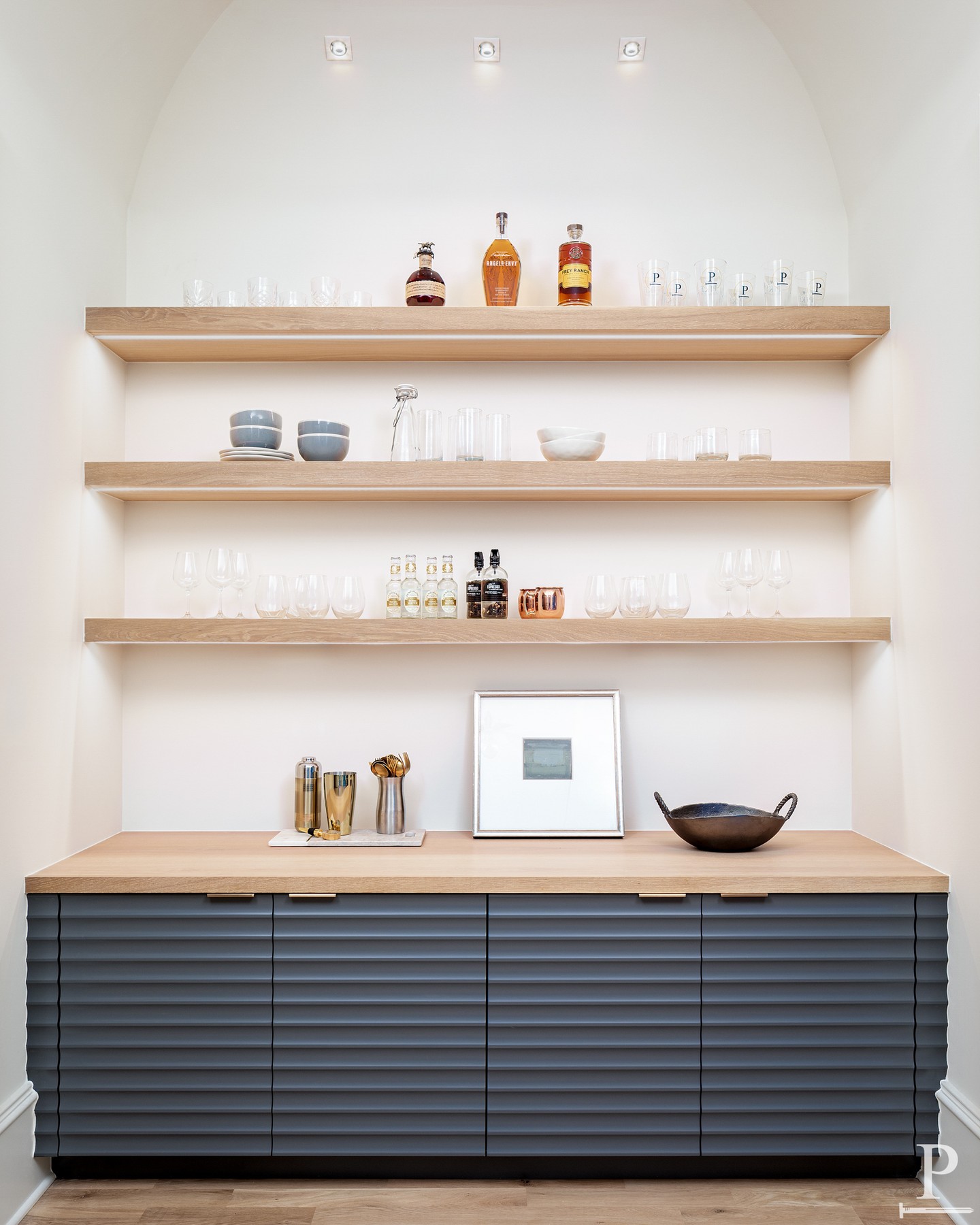 We don't just build homes. We build reasons to stay in them.

This arched bar niche might be our favorite excuse yet.