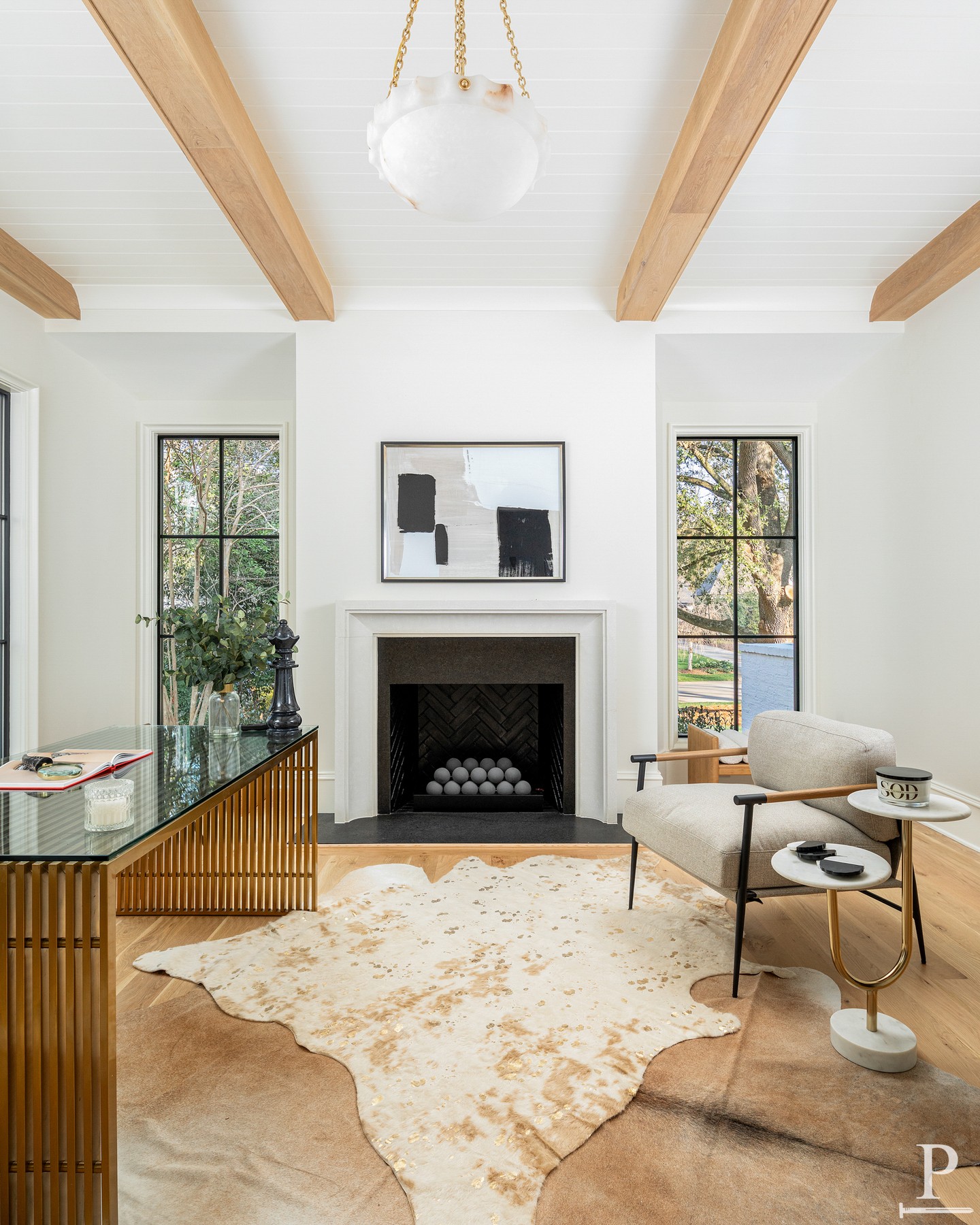Brass, beams, and a fireplace. Not a bad place to get some work done. ✨