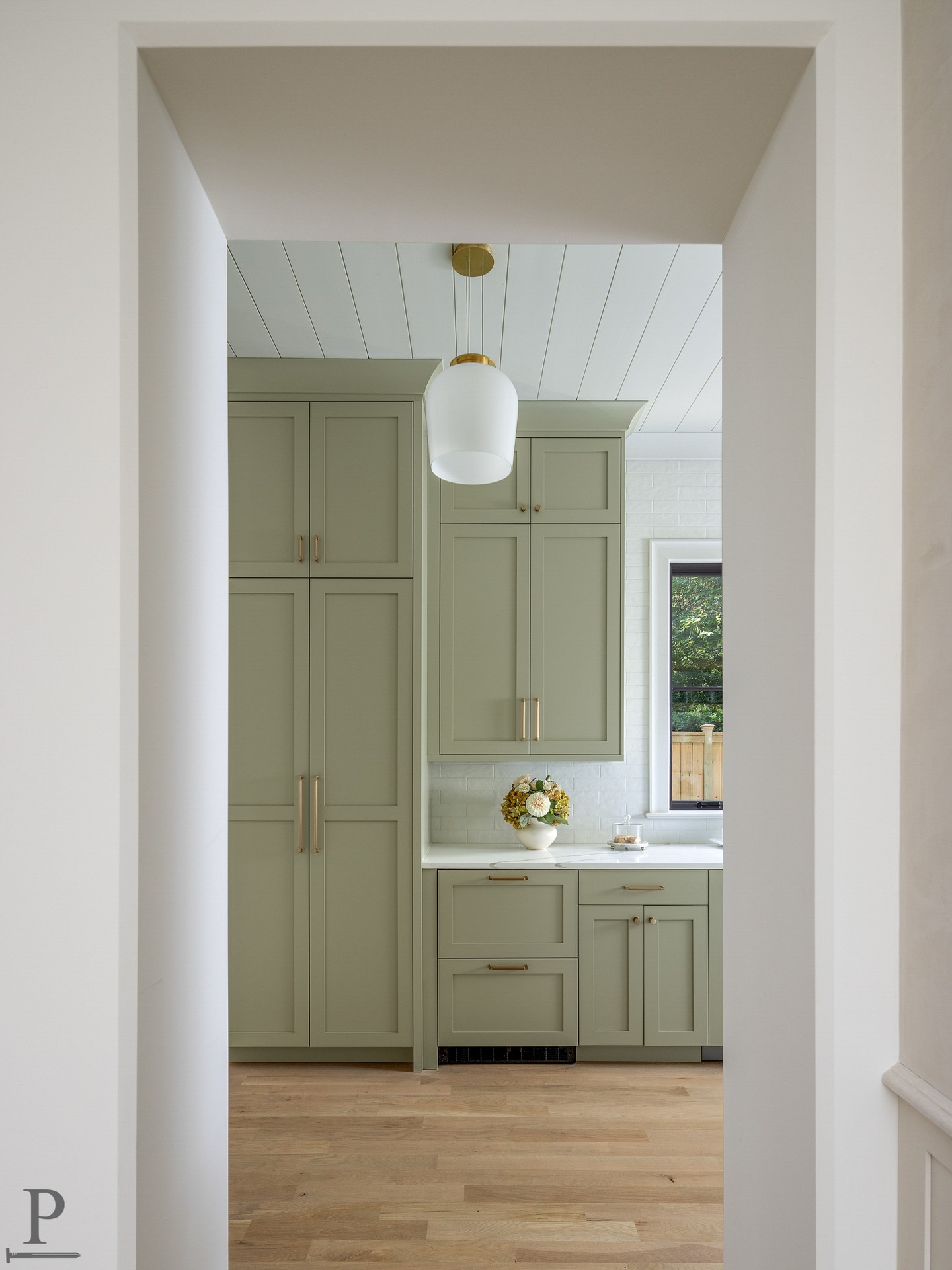 The scullery at 4110 Melchor might be our favorite room in the house. 🌿
Benjamin Moore Cheyenne Green cabinetry, champagne bronze hardware, a farmhouse sink, and enough storage to actually keep your kitchen looking clean.

Move-in ready in Cotswold. DM us to schedule a private showing.