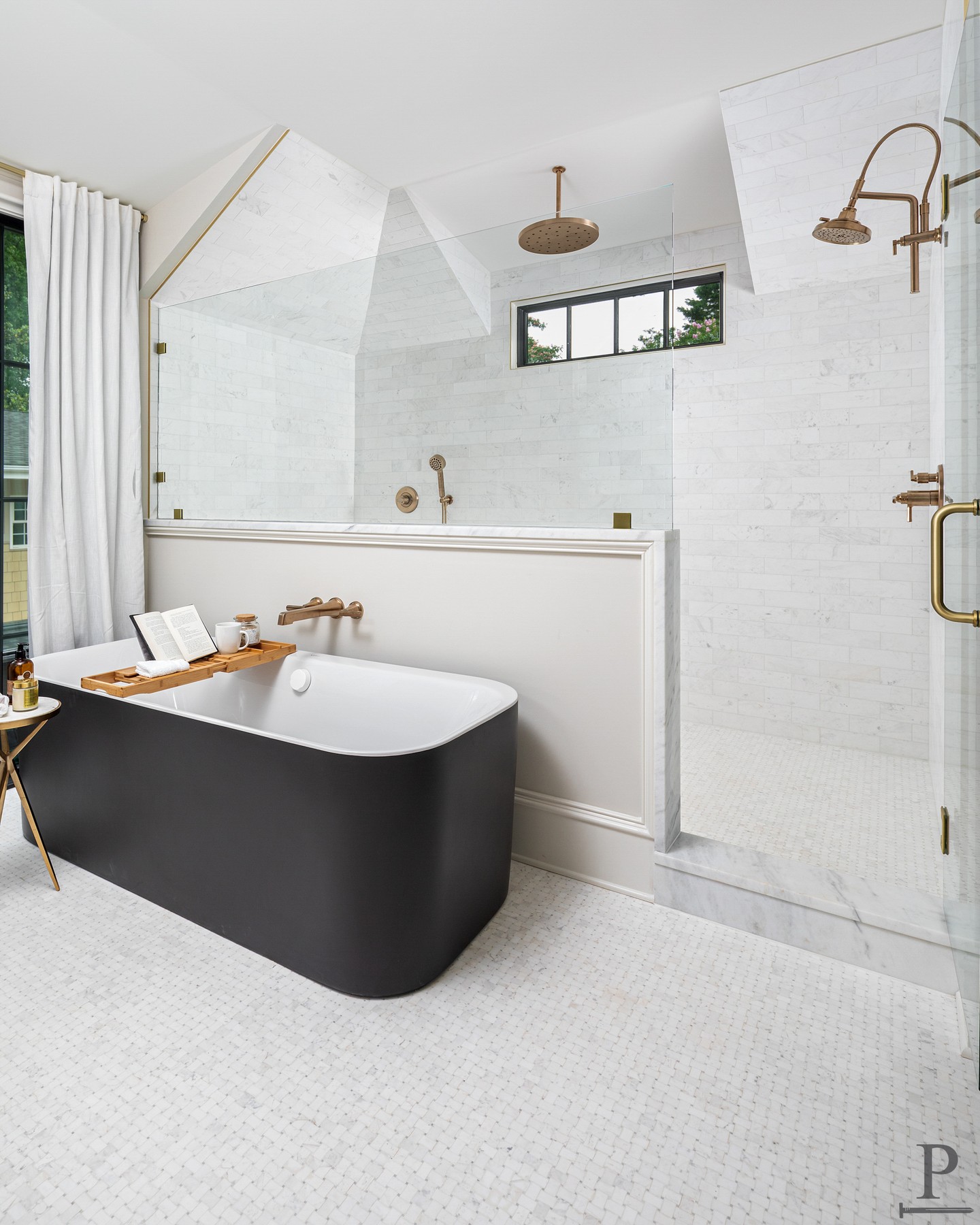 Herringbone niches, a rain shower, a tub made for staying in. Some rooms just do more. 🫧