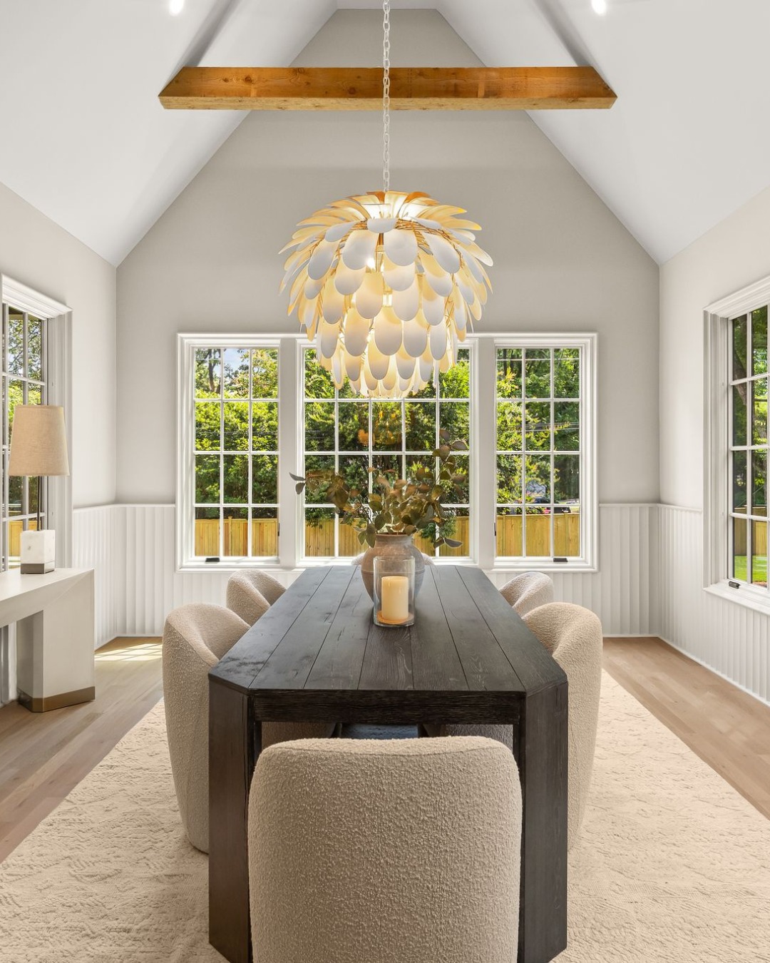 5555 Lansing knows how to make an entrance, even at the dinner table. Vaulted ceilings give this dining room room to breathe, and the natural cedar beams keep it from feeling too polished. The chandelier sits right at the center of it all, doing a lot of the work without overwhelming the space.
It's the kind of room that makes you want to linger after dinner is over. ☀️
Come see it in person, this one won't sit long.