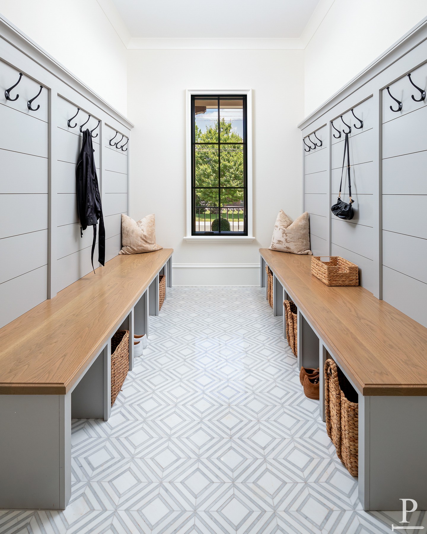 Custom lockers, a puppy dining station, and a floor pattern with just enough personality, all tucked right off the garage.

Function first, without sacrificing the look. 🐾