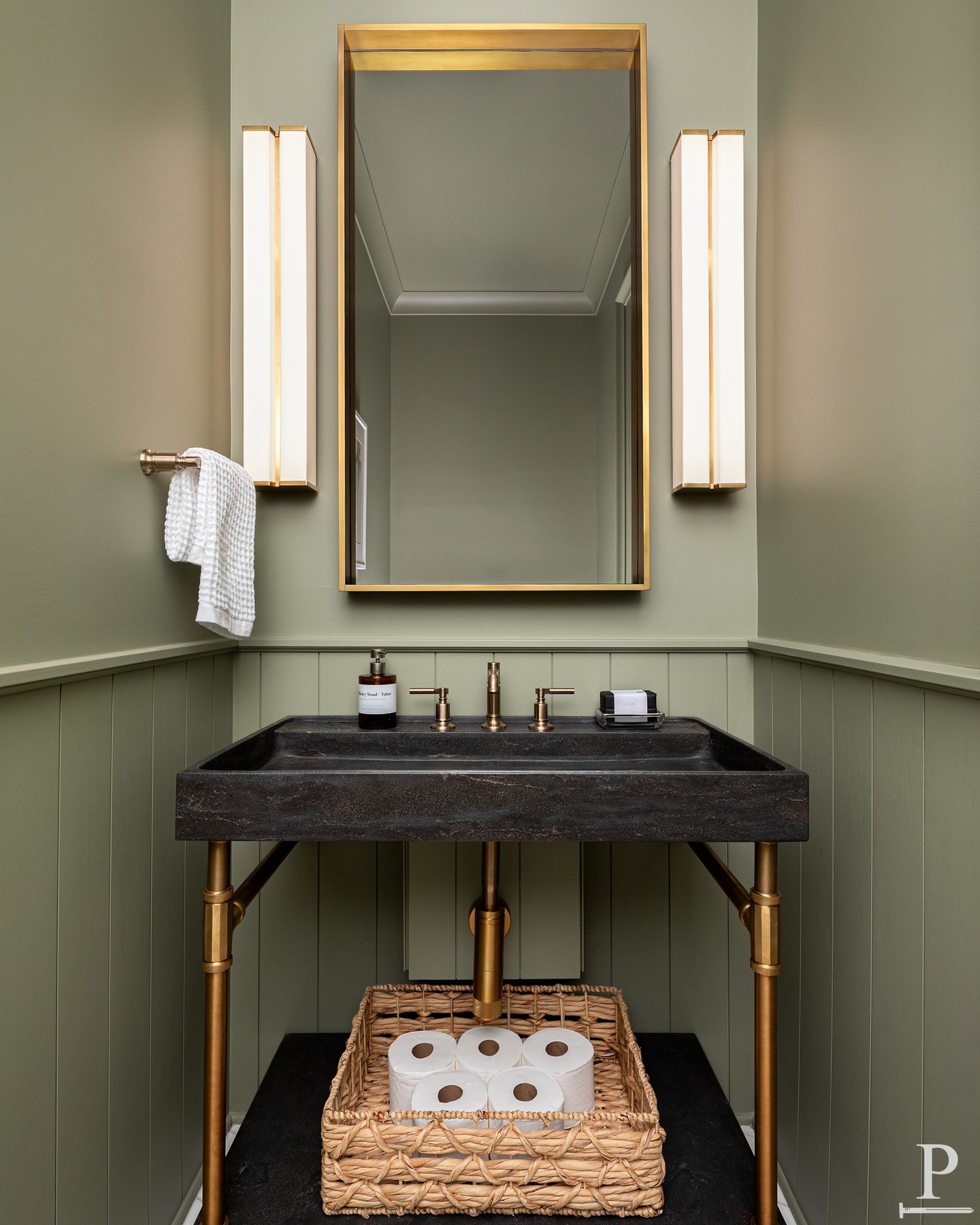 A powder room that leans into color. 🌿

Moody sage walls, a black stone console sink, and warm brass details that bring it all together.

Small space, big impact.
