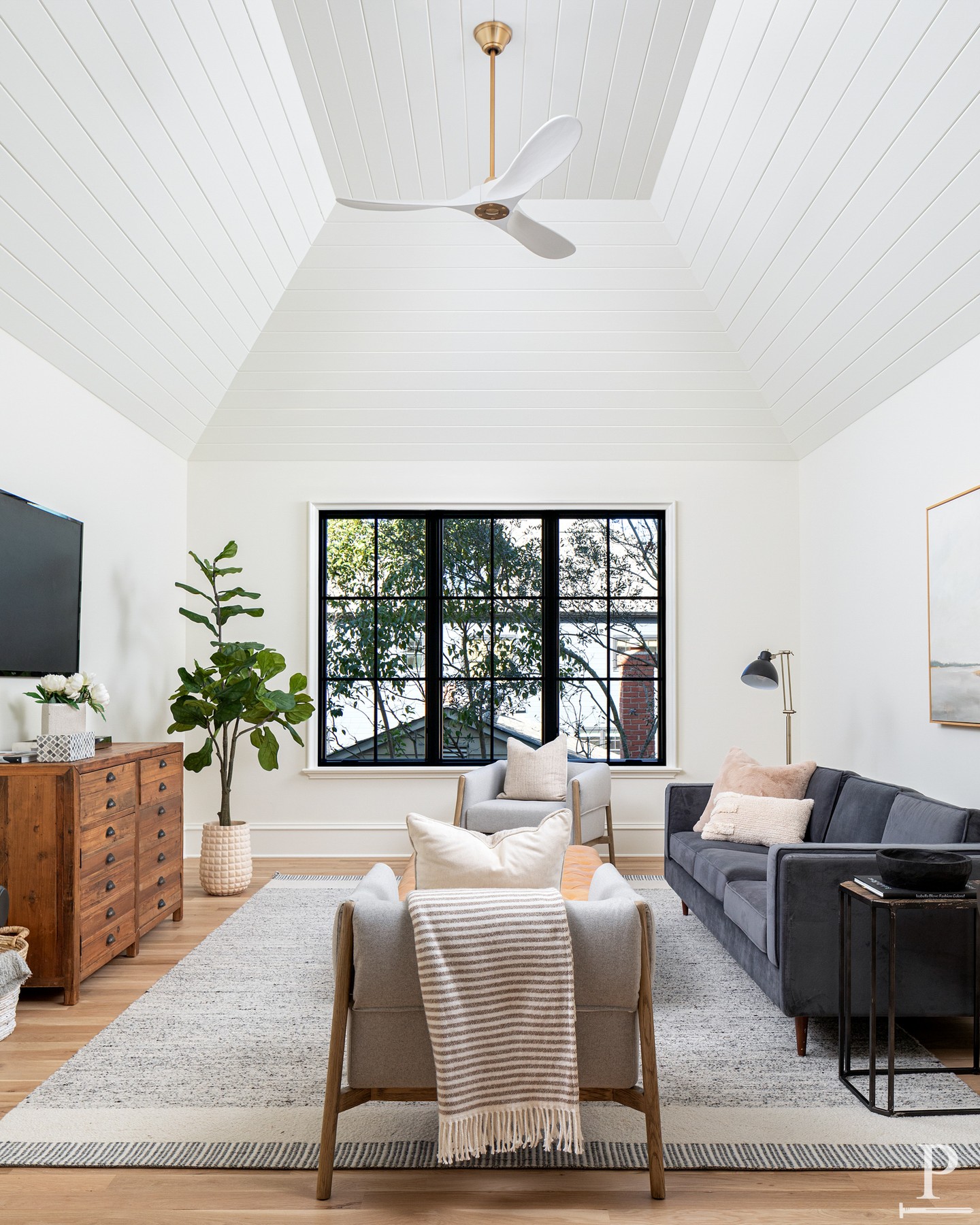 A vaulted shiplap ceiling gives this bonus room instant character. 🤍

Room to gather, room to spread out, and views that carry the whole space.