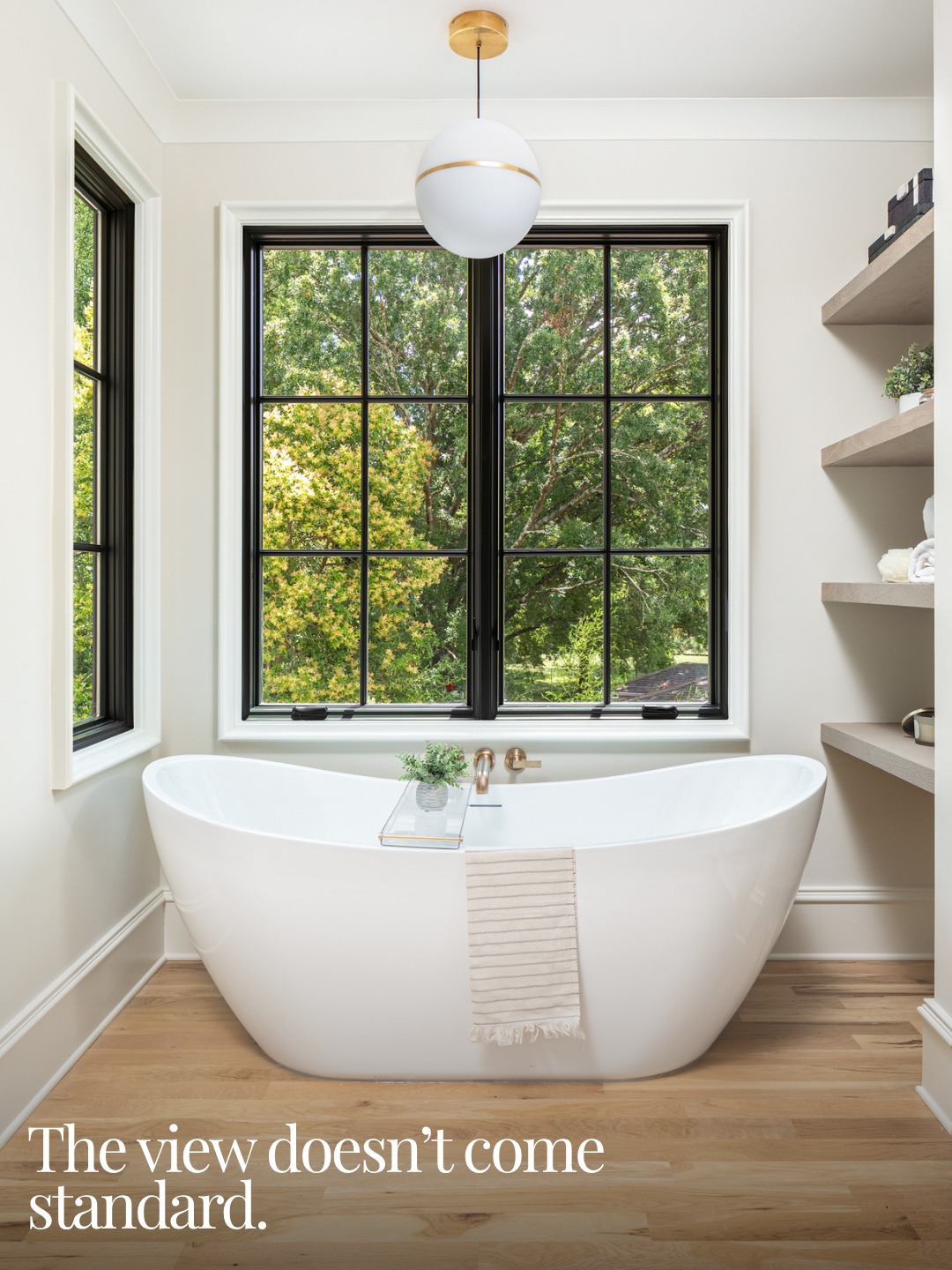 Some bathrooms are functional. This one is a reason to wake up early.

Carrara marble vanities, brushed brass fixtures, and a soaking tub positioned to catch the morning light through the trees. Even the shower floor got the detail treatment, a hex pattern that turns a practical surface into a design moment.

This is what "primary suite" should mean.