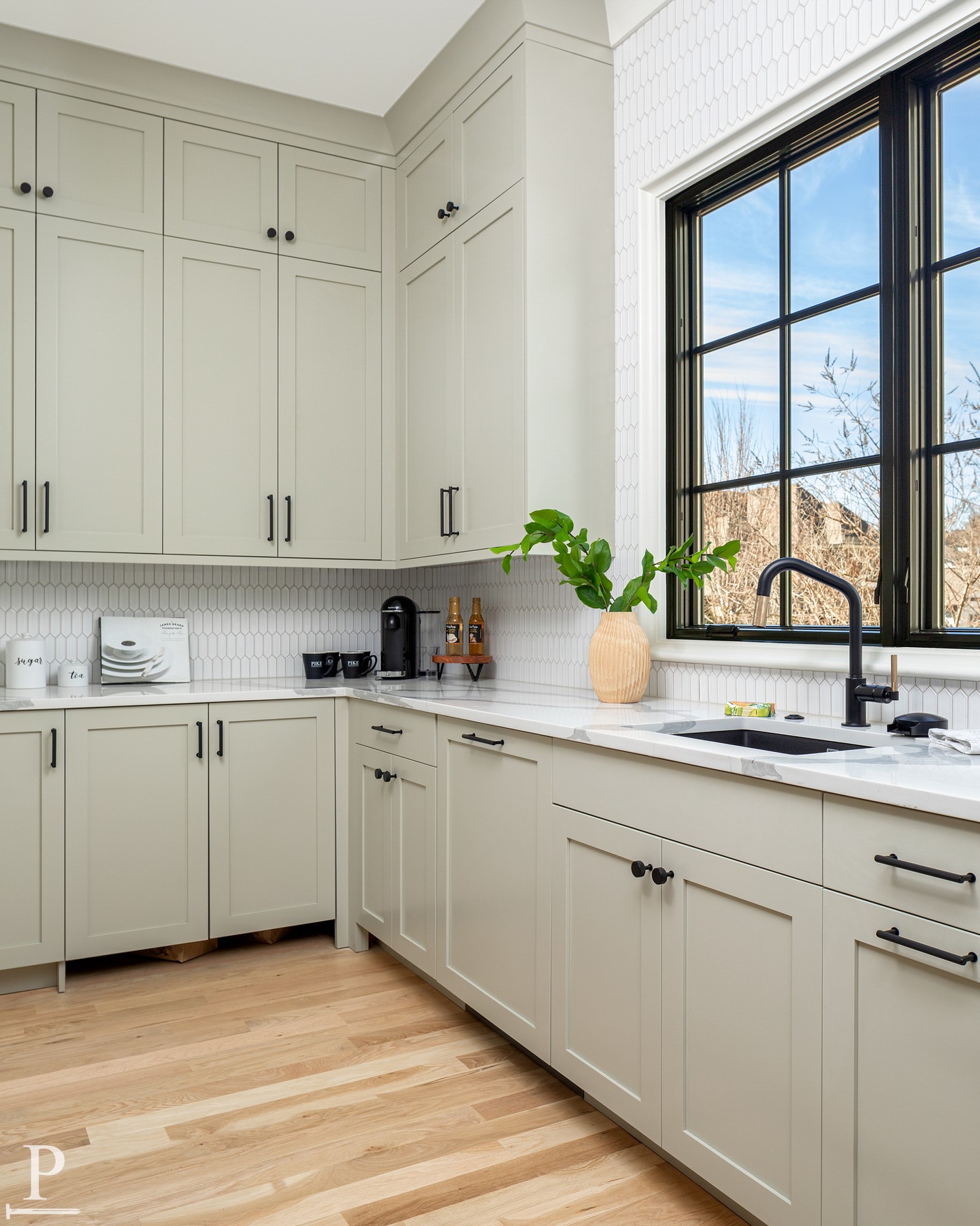 Every great kitchen has a scullery working quietly behind it.

The Medford plan's includes a hidden grocery door for unloading straight from the garage, a live-edge wine wall, full-size fridge, and a second sink for the prep work nobody needs to see.

This is the room that makes entertaining look effortless.