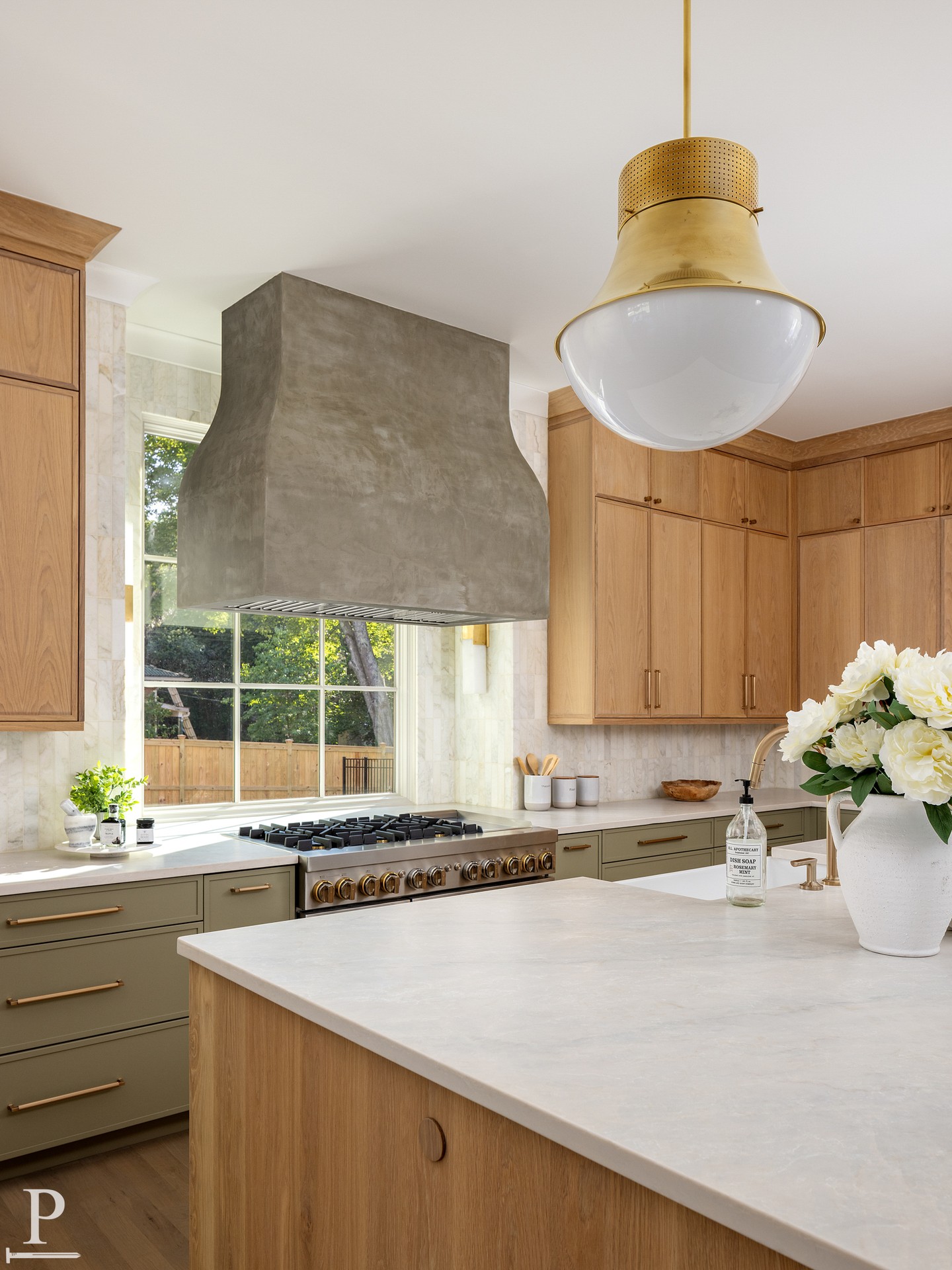 This kitchen pairs white oak cabinetry with Benjamin Moore Hampshire Gray, warmed up by a custom plaster range hood and brass fixtures throughout. Just one of the standout spaces in the Highland plan. 

Interested in hearing about our available homes? Reach out to learn more.
